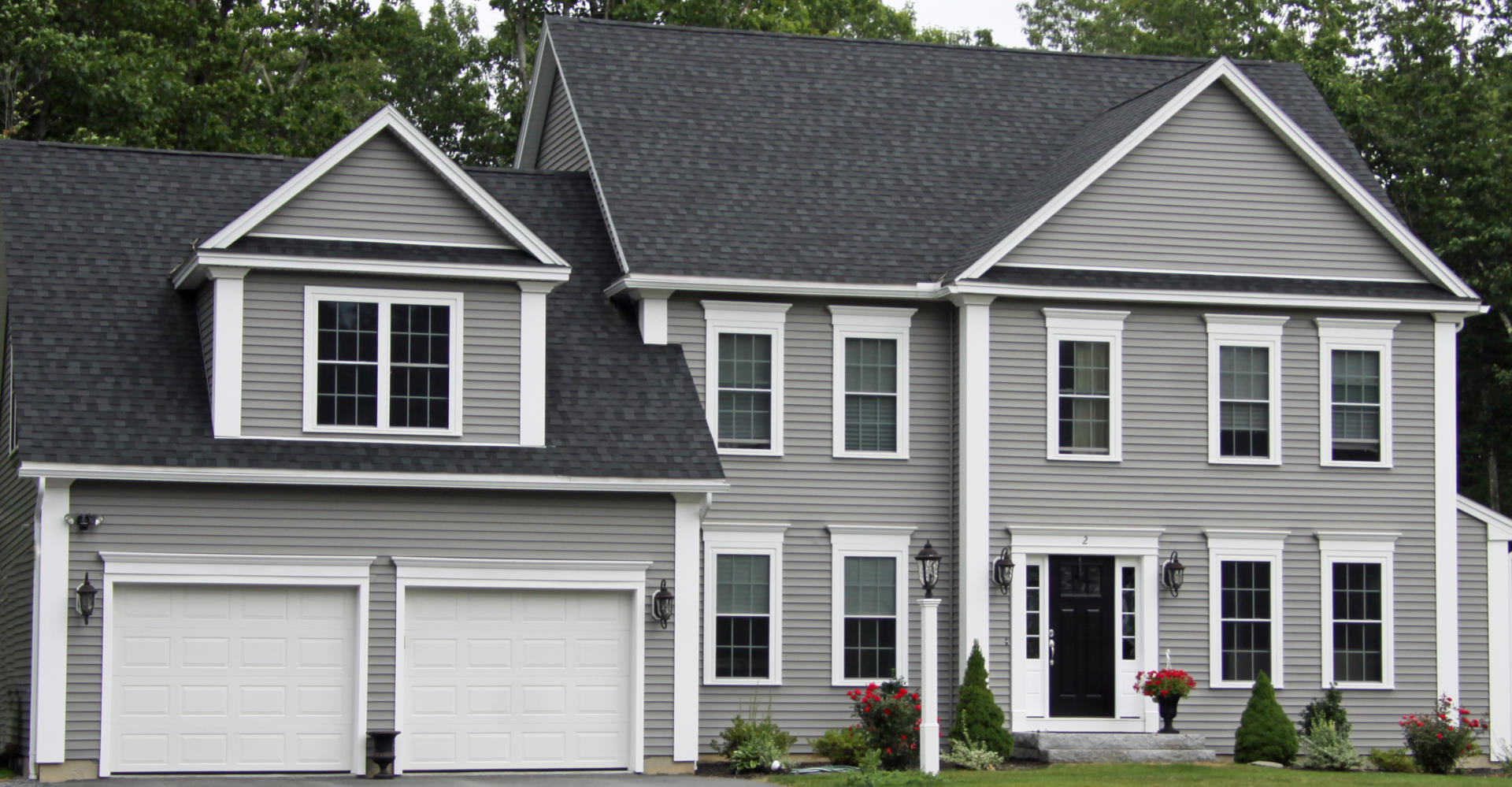 Custom colonial with two-car garage